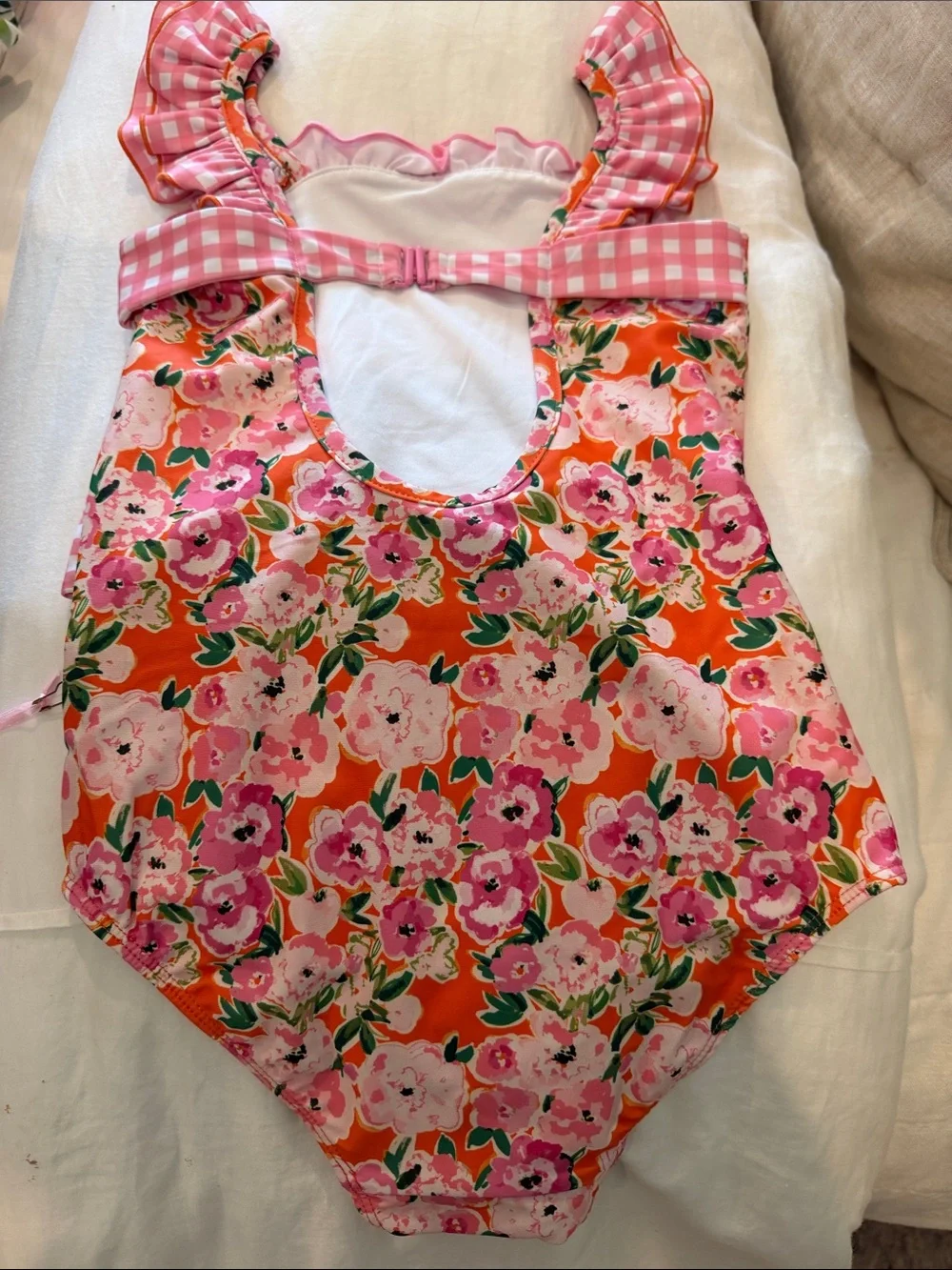 SweetHoney Pink Floral Swim Suit with Orange Background